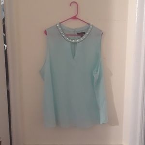 Beautiful Teal sleeveless blouse, see through.